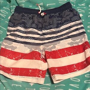 Tommy Bahama Red, White & Navy American Flag Swim Board Shorts.
